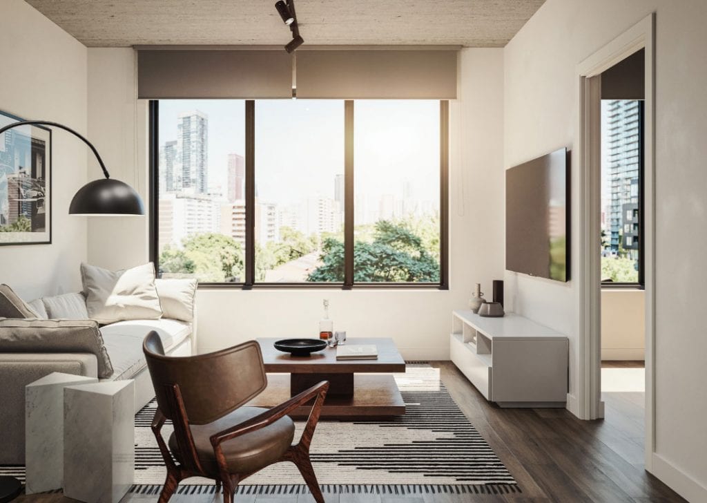 Bright living room with city skyline view, contemporary furniture, and natural light.